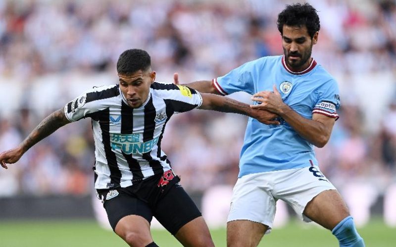 bruno-guimaraes-e-gundogan-disputam-bola-durante-newcastle-x-manchester-city-1661102355446_v2_900x506-r1jgzp3xynzg82ciho15fxc09ba3vopauyjcj0ag08 Home V2